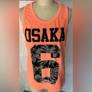 Superdry . Men’s medium but fits small. Neon orange.